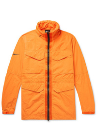 Оранжевая полевая куртка от Nike
