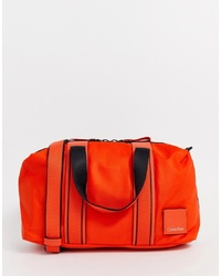 Женская оранжевая спортивная сумка от Calvin Klein