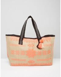 Женская оранжевая сумка с вышивкой от Mango