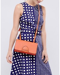 Оранжевая сумка через плечо от Warehouse