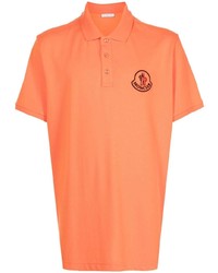 Мужская оранжевая футболка-поло с вышивкой от Moncler