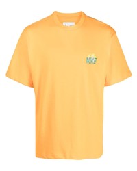 Мужская оранжевая футболка с круглым вырезом с вышивкой от Nike