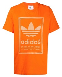 Мужская оранжевая футболка с круглым вырезом с принтом от adidas