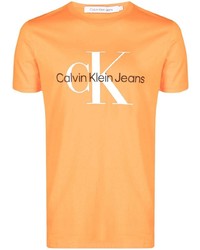 Мужская оранжевая футболка с круглым вырезом с принтом от Calvin Klein Jeans