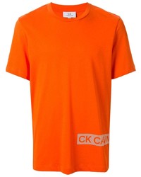 Мужская оранжевая футболка с круглым вырезом с принтом от CK Calvin Klein