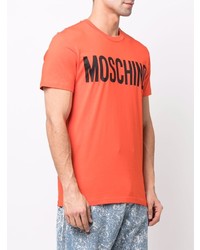 Мужская оранжевая футболка с круглым вырезом с принтом от Moschino