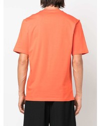 Мужская оранжевая футболка с круглым вырезом с принтом от Moschino