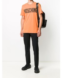 Мужская оранжевая футболка с круглым вырезом с принтом от Moschino