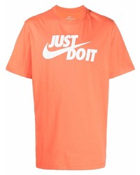 Мужская оранжевая футболка с круглым вырезом с принтом от Nike