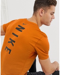 Мужская оранжевая футболка с круглым вырезом с принтом от Nike Running