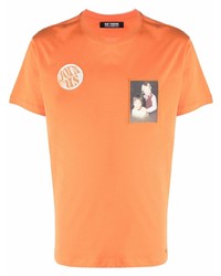 Мужская оранжевая футболка с круглым вырезом с принтом от Raf Simons