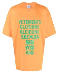 Мужская оранжевая футболка с круглым вырезом с принтом от Vetements