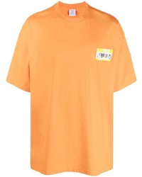 Мужская оранжевая футболка с круглым вырезом с принтом от Vetements