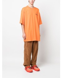 Мужская оранжевая футболка с круглым вырезом с принтом от Tommy Jeans