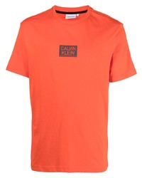 Мужская оранжевая футболка с круглым вырезом от Calvin Klein