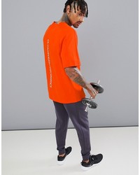 Мужская оранжевая футболка с круглым вырезом от Calvin Klein Performance