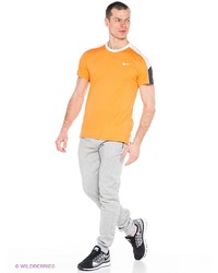 Мужская оранжевая футболка от Nike