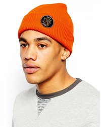 Мужская оранжевая шапка от Brixton