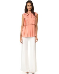 Оранжевая шелковая блузка от Rochas