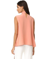 Оранжевая шелковая блузка от Rochas