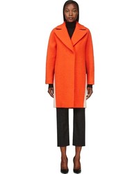 Женское оранжевое пальто от Cédric Charlier