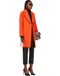 Женское оранжевое пальто от Cédric Charlier