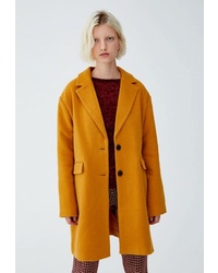 Женское оранжевое пальто от Pull&Bear