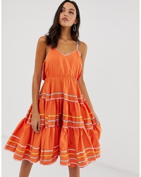 Оранжевое платье с пышной юбкой с вышивкой от Forever Unique