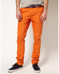 Оранжевые брюки чинос от Cheap Monday
