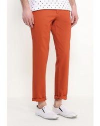 Оранжевые брюки чинос от Dockers