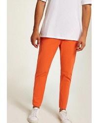 Оранжевые брюки чинос от Topman