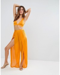 Женские оранжевые брюки от Asos