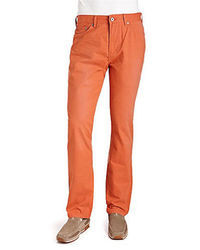 Оранжевые вельветовые джинсы