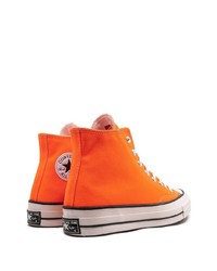 Мужские оранжевые высокие кеды из плотной ткани от Converse