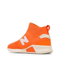Мужские оранжевые высокие кеды от New Balance