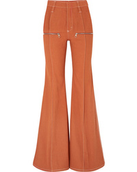 Оранжевые джинсы-клеш