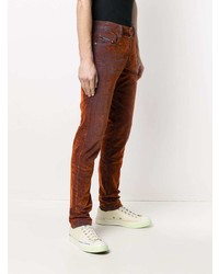 Мужские оранжевые джинсы с принтом тай-дай от Diesel