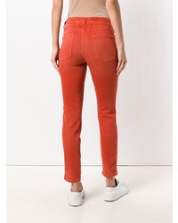 Оранжевые джинсы скинни от Closed