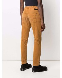 Мужские оранжевые джинсы от Diesel