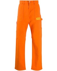 Мужские оранжевые джинсы от Versace