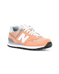 Женские оранжевые замшевые низкие кеды от New Balance