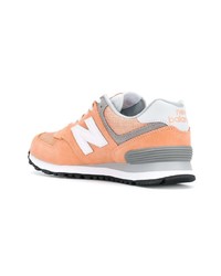 Женские оранжевые замшевые низкие кеды от New Balance