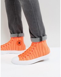 Мужские оранжевые кеды от Converse