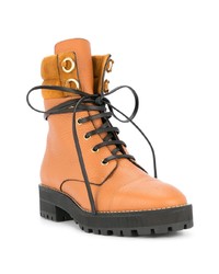 Женские оранжевые кожаные ботинки на шнуровке от Stuart Weitzman