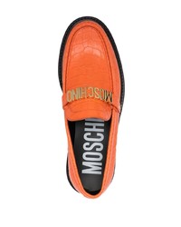 Мужские оранжевые кожаные лоферы от Moschino