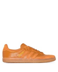 Мужские оранжевые кожаные низкие кеды от adidas