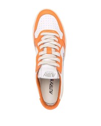 Мужские оранжевые кожаные низкие кеды от AUTRY