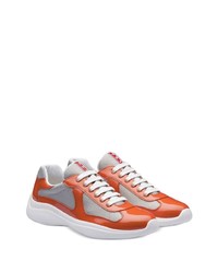 Мужские оранжевые кожаные низкие кеды от Prada