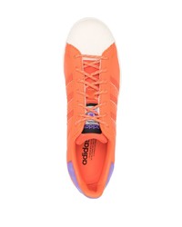 Мужские оранжевые кожаные низкие кеды от adidas