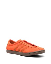 Мужские оранжевые кожаные низкие кеды от adidas